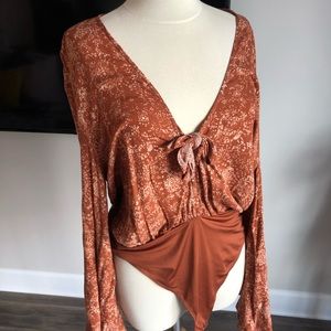 Burnt orange long sleeve bodysuit